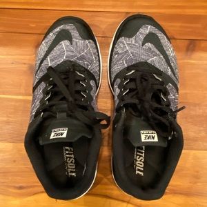 Women’s black and white Nike athletic shoes. Five 6 1/2